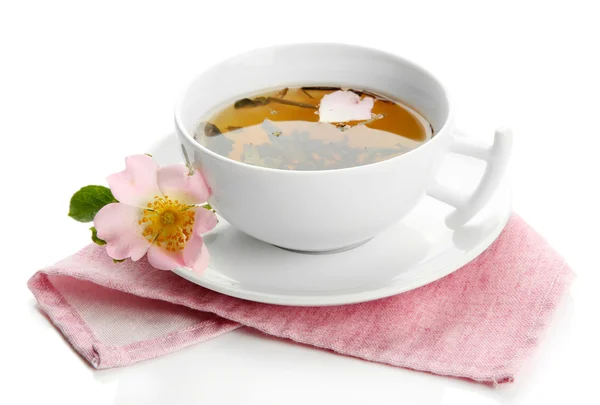 Cup of herbal tea with hip rose flowers, isolated on white — Stock Photo, Image