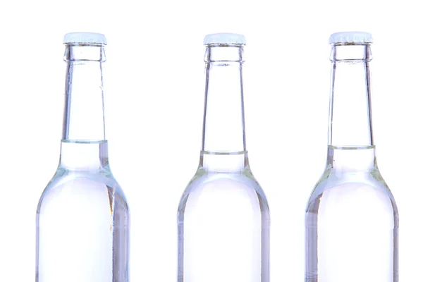 Botellas de agua aisladas en blanco — Foto de Stock