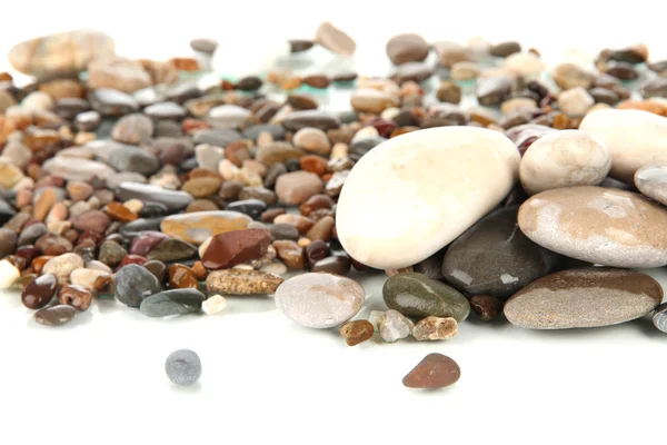 Deniz taşları üzerinde beyaz izole — Stok fotoğraf