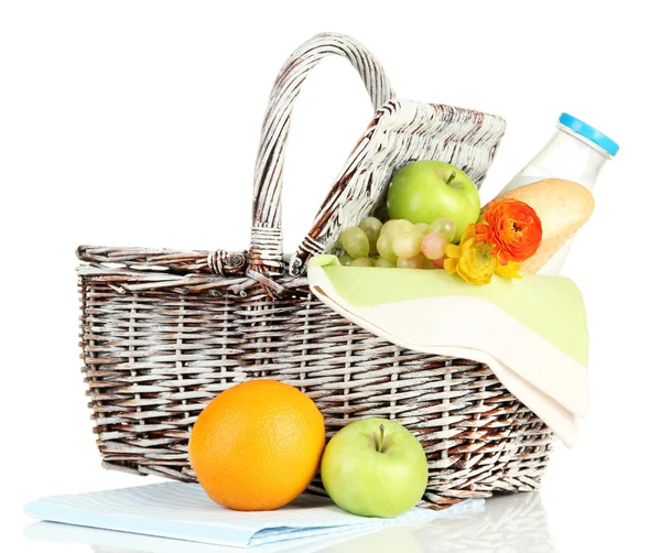 Picnic basket with fruits and bottle of milk, isolated on white — Stock Photo, Image