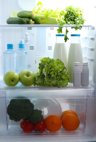 Open refrigerator with vegetarian food — Stock Photo, Image