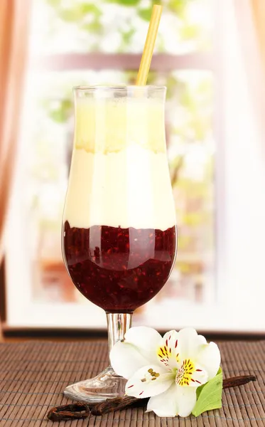 Delicious fruit smoothie on window background — Stock Photo, Image
