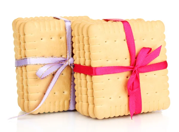 Dolci biscotti legati con nastri colorati isolati su bianco — Foto Stock