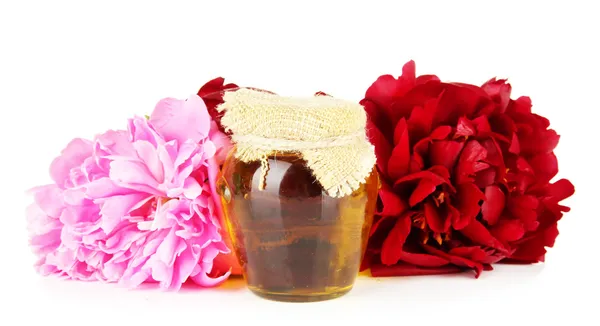 Jar ハニカム、蜂蜜の白で隔離され、牡丹の花を持つ — ストック写真