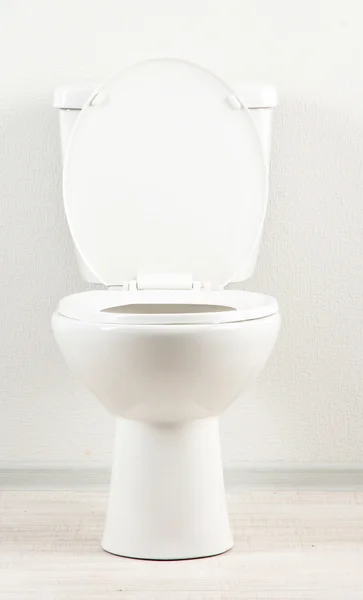 White toilet bowl in a bathroom — Stock Photo, Image