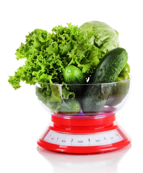 Fresh vegetables in scales isolated on white — Stock Photo, Image