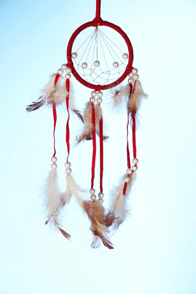 Beautiful dream catcher on blue background — Stock Photo, Image