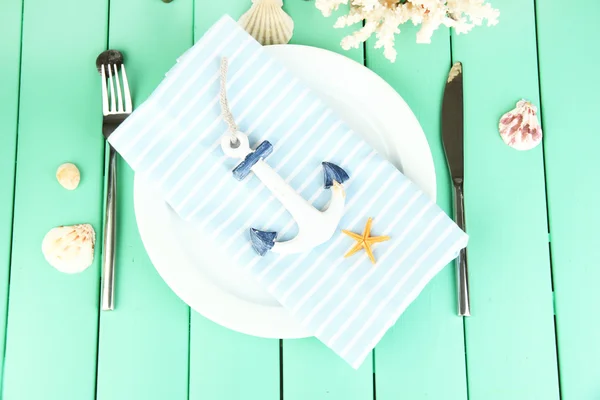 Marine table setting on color wooden background — Stock Photo, Image