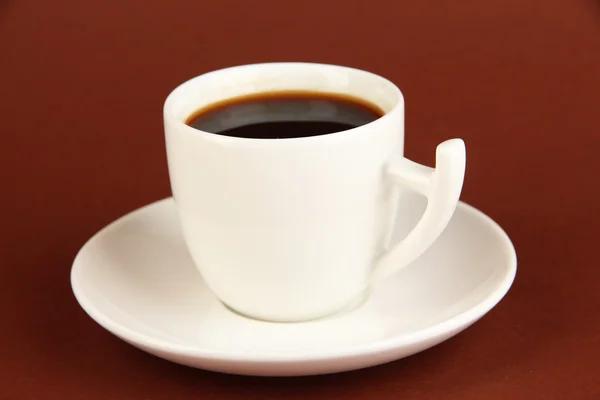 Cup of strong coffee on brown background — Stock Photo, Image