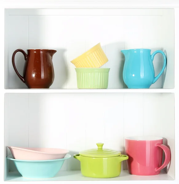 Kitchen utensils on beautiful white shelves — Stock Photo, Image