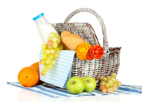 Picnic basket with fruits and bottle of milk, isolated on white — Stock Photo, Image