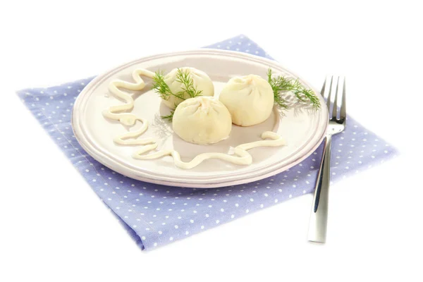 Tasty khinkali on plate, isolated on white — Stock Photo, Image