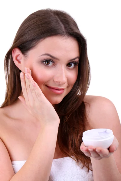 Woman applying lifting cream from container on face, isolated on white — Stock Photo, Image