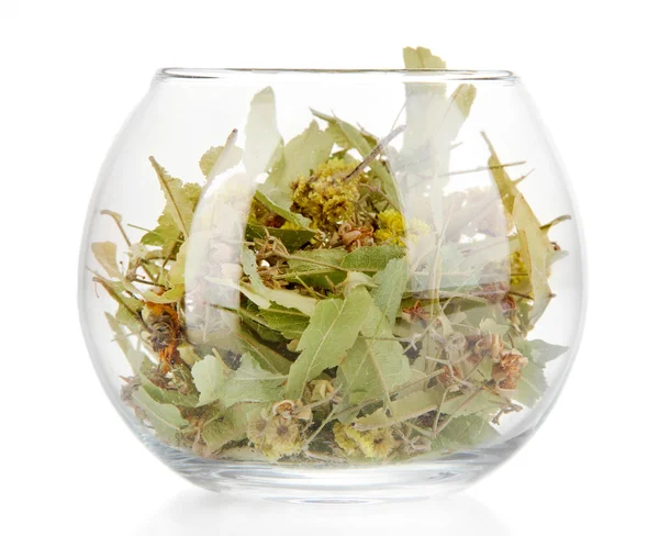 Dried herb in glass container isolated on white — Stock Photo, Image