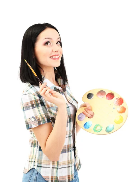 Beautiful young woman painter with brushes and palette, isolated on white — Stock Photo, Image