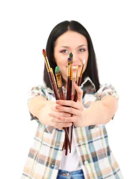 Güzel bir genç kadın ressam üzerine beyaz izole fırçaları ile — Stok fotoğraf