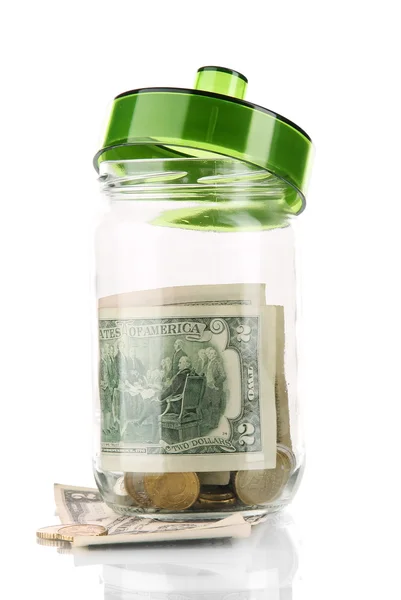 Glass jar with money isolated on white — Stock Photo, Image