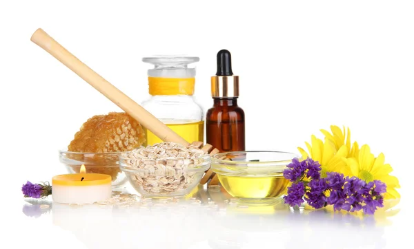 Fragrant honey spa with oils and honey isolated on white — Stock Photo, Image