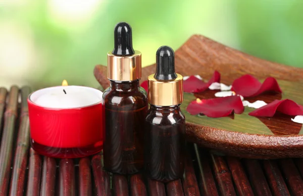 Spa composition with aroma oils on table on bright background — Stock Photo, Image