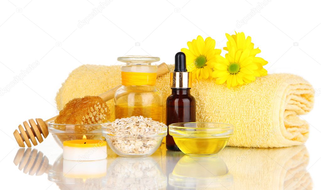 Fragrant honey spa with oils and honey isolated on white