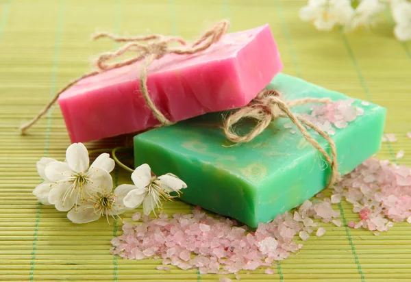 Natural handmade soap on bamboo mat — Stock Photo, Image