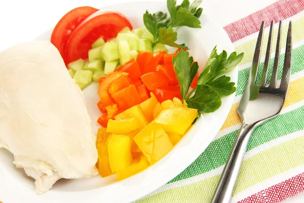 Boiled chicken breast on plate with vegetables close up — Stock Photo, Image