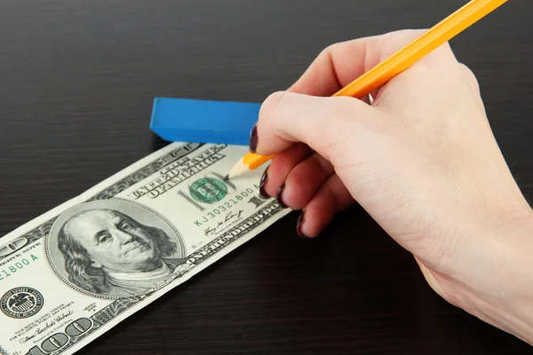 Making fake dollar on wooden background — Stock Photo, Image