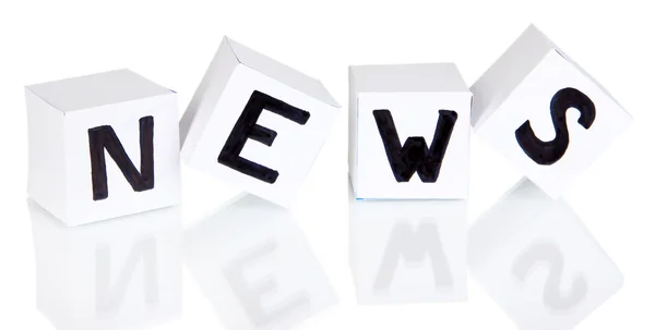 White paper cubes labeled "News" isolated on white — Stock Photo, Image