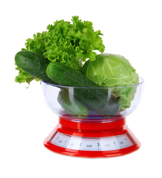 Fresh vegetables in scales isolated on white — Stock Photo, Image