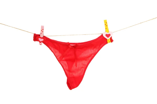 Women's panties hanging on rope isolated on white — Stock Photo, Image