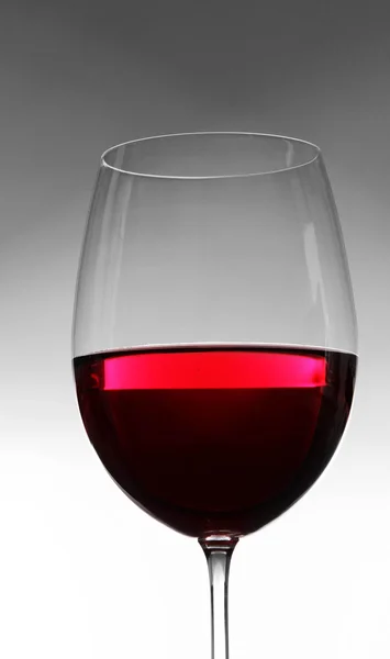 Glass of wine on gray background — Stock Photo, Image