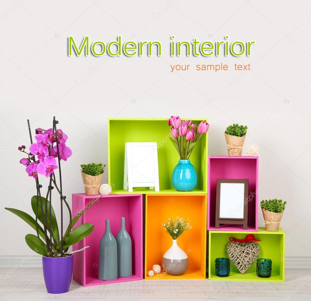 Beautiful colorful shelves with different home related objects