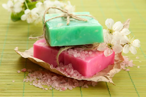 Natural handmade soap on bamboo mat — Stock Photo, Image