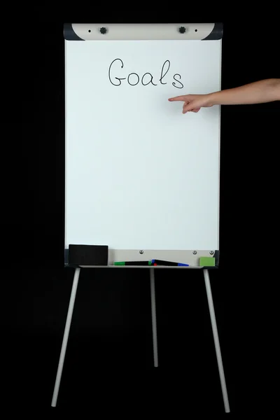 Flipchart op zwarte achtergrond — Stockfoto