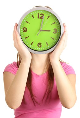 Kız holding saatin üzerinde beyaz izole yüz üzerine