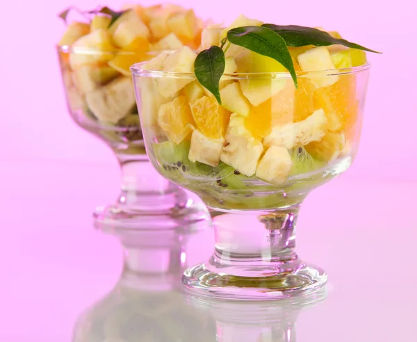 Fruit salad in a sundae dish on a light background — Stock Photo, Image