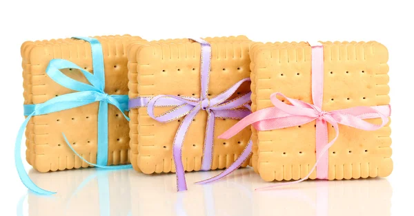 Dolci biscotti legati con nastri colorati isolati su bianco — Foto Stock