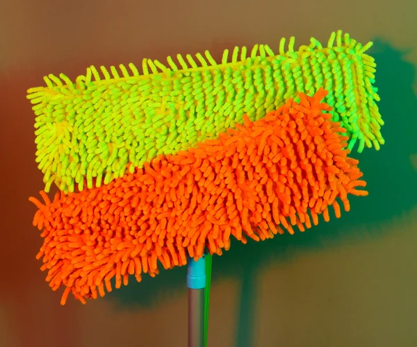 Two mops for floor on bright background — Stock Photo, Image