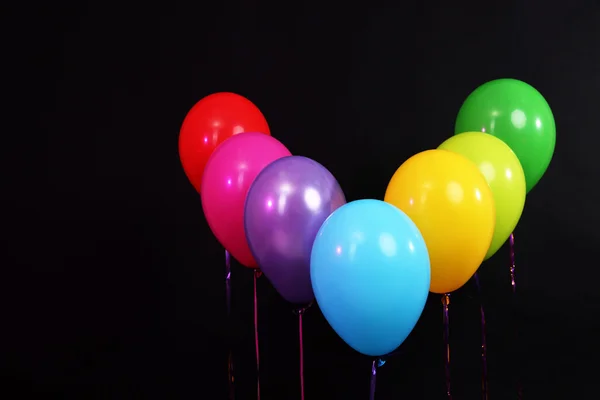 Balloons rainbow colors isolated on black — Stock Photo, Image