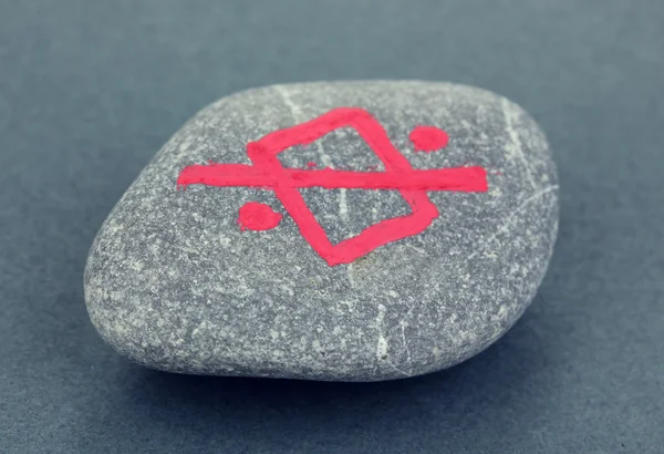 Fortune telling with symbols on stone on grey background — Stock Photo, Image