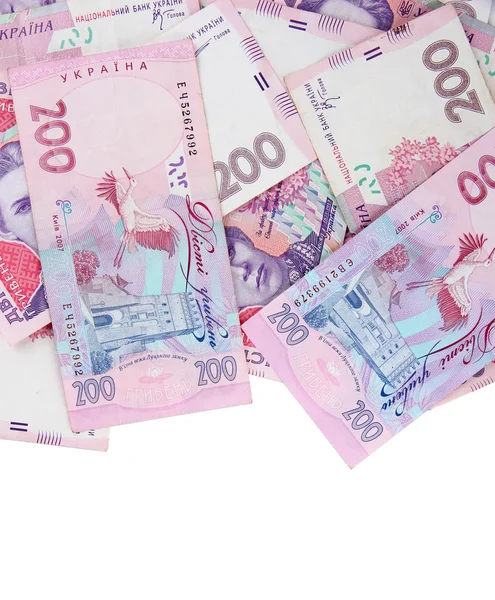 Stapel Oekraïense geld, geïsoleerd op wit — Stockfoto