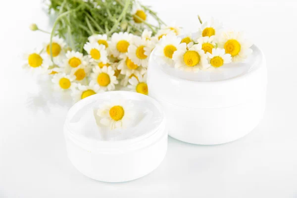 Cream with chamomile isolated on white — Stock Photo, Image