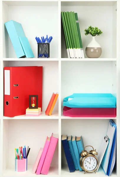 White office shelves with different stationery, close up — Stock Photo, Image