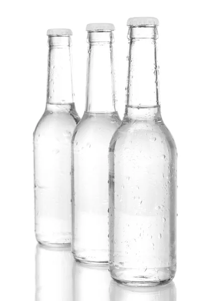 Wasserflaschen isoliert auf weiß — Stockfoto