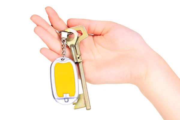 钥匙串房子钥匙在手上白色隔离 — 图库照片