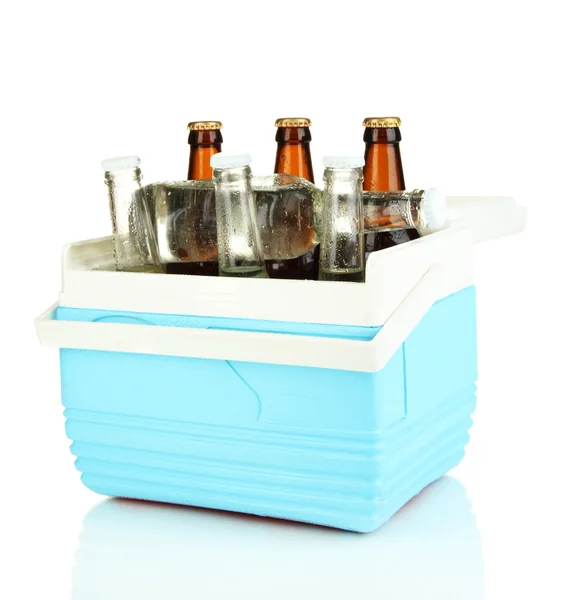 Traveling refrigerator with beer bottles and ice cubes isolated on white — Stock Photo, Image
