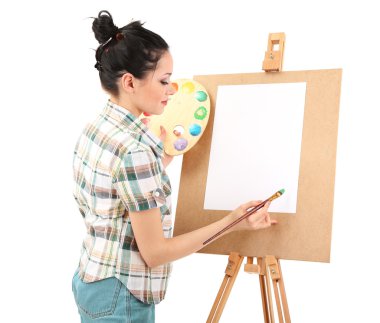 güzel bir genç kadın ressam üzerine beyaz izole iş başında