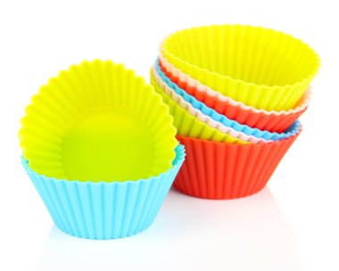 yığın üzerinde beyaz izole renkli cupcake olguların