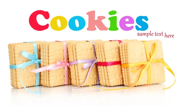 Sweet cookies tied with colorful ribbons isolated on white — Stock Photo, Image