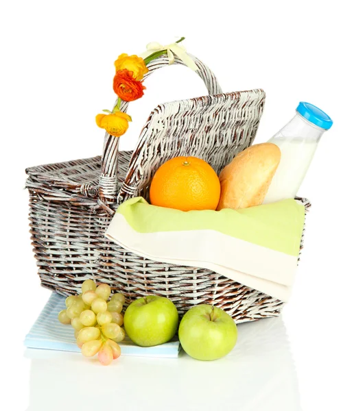 Picnic basket with fruits and bottle of milk, isolated on white — Stock Photo, Image